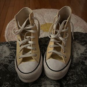 Kids size 5 pastel yellow converse high top sneakers